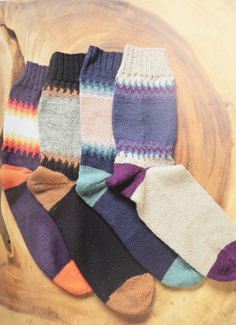 Happily Knitting Socks by Mr. Knitbear & Dendennis